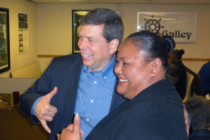 Senator Begich with Hilton employee Fale.